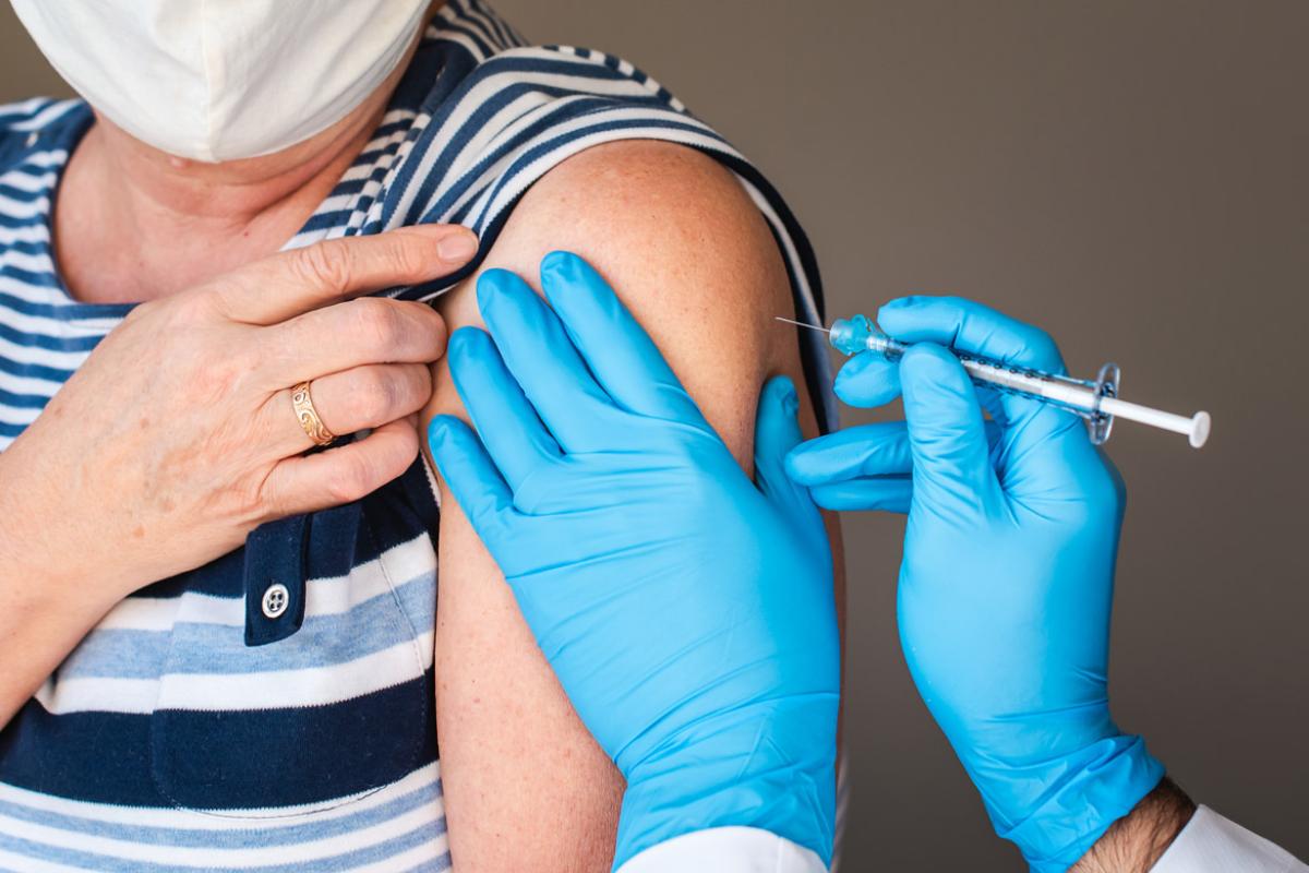 Person receiving vaccine