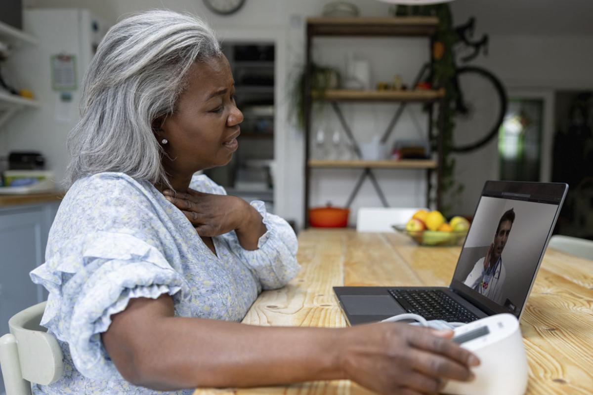 Patient speaking to physician during a telehealth conference